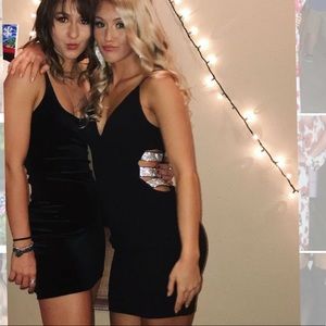 Little black AKIRA dress with a twist